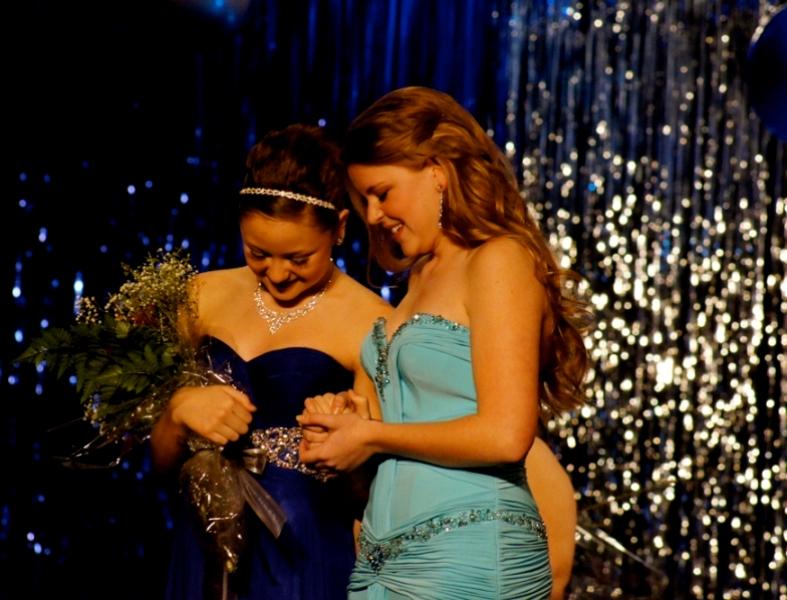 Standing on stage next to sophomore Abby Felter (right), sophomore Emma Wernecke is announced Miss Starr's Mill 2013.