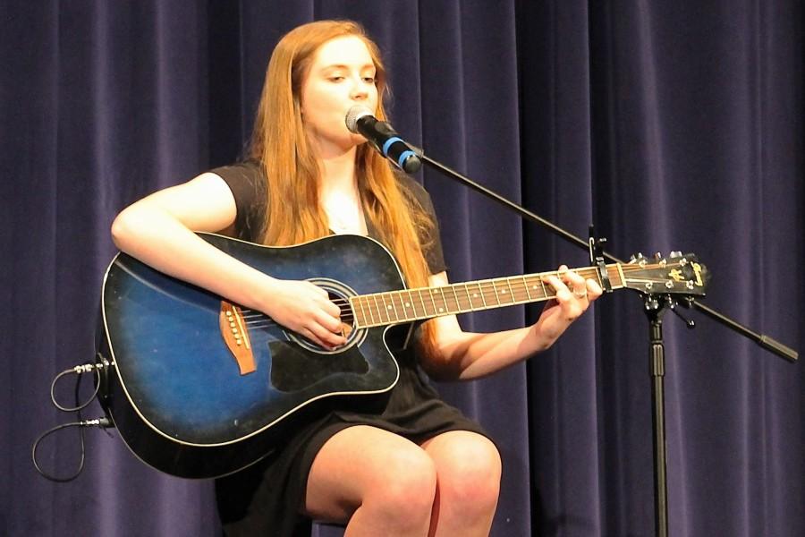 Freshman Morgan Beck played her guitar and sang "Parachute" by Ingrid Michaels. 