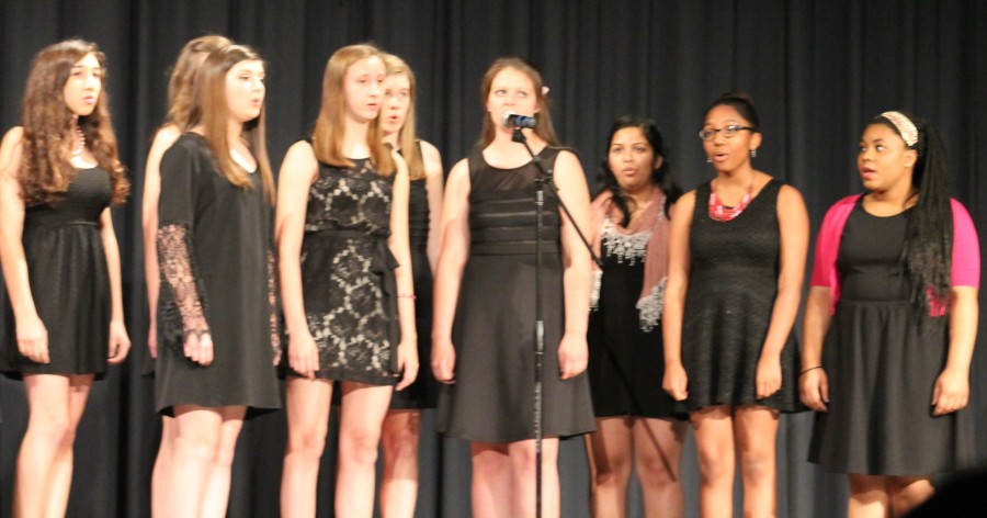 Members of An Octave Above sang "Pink Panther" and "Hallelujah" in dashes of pink. 