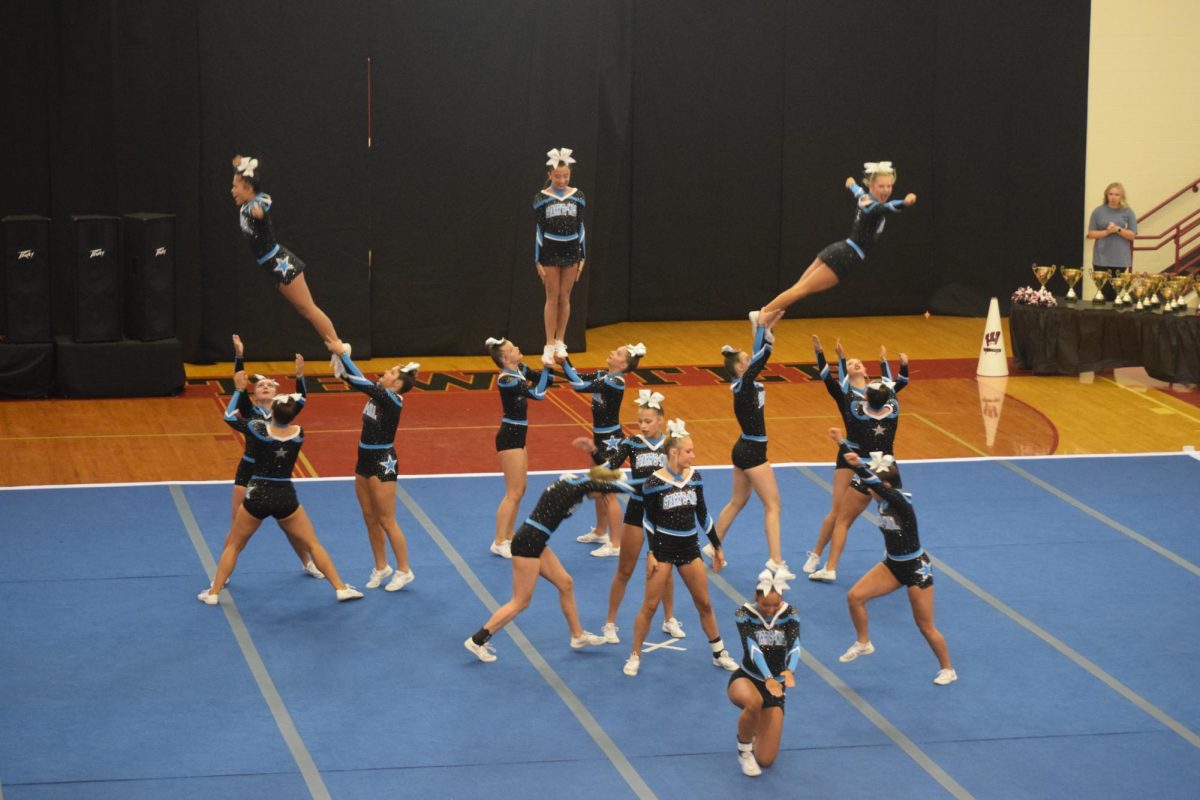 Starr’s Mill Panthers are stunting to their Star Wars themed routine. Varsity competition cheer earned a season-high score of 94.5 at the Whitewater Invitational.