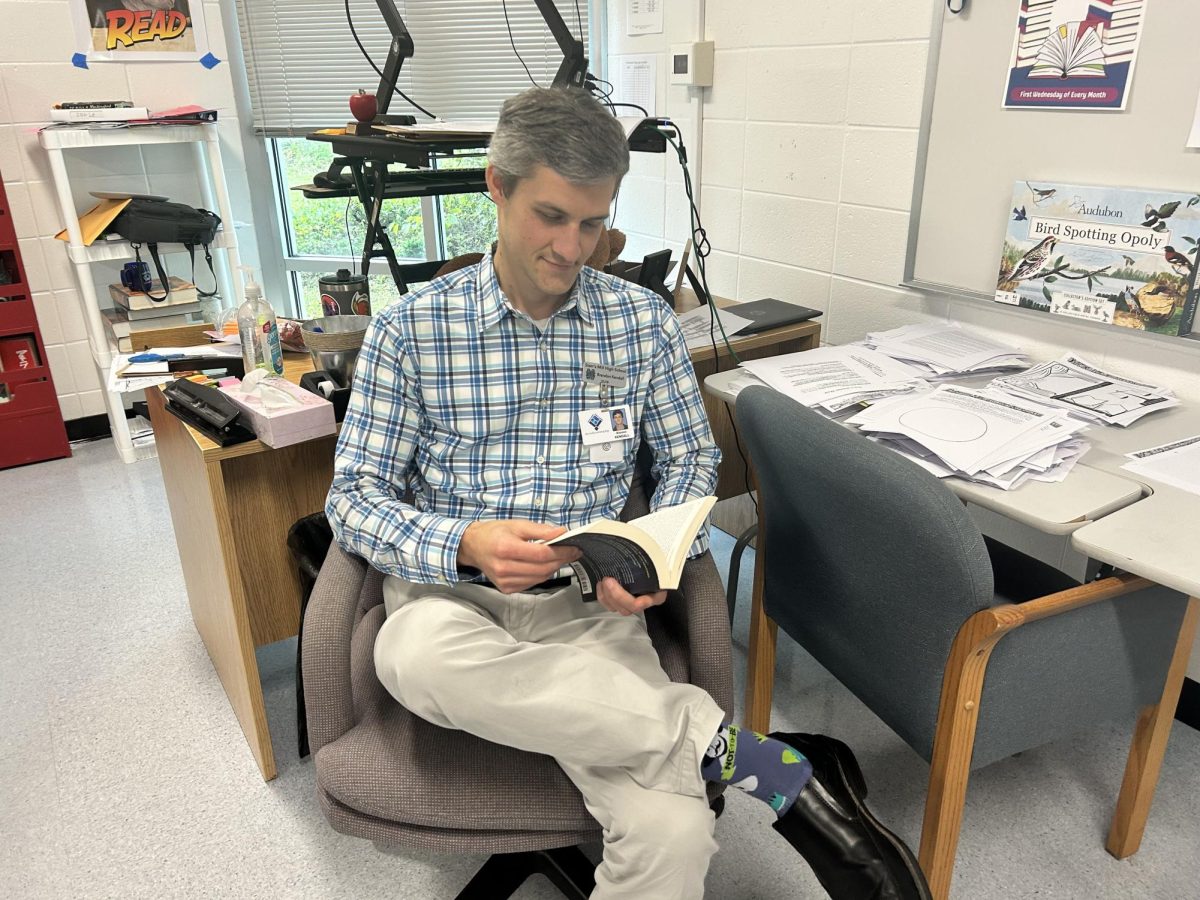 English teacher Brandon Kendall is currently reading “House of Suns” by Alastair Reynolds. This book follows the journey of space explorers Campion and Purslane as they seek who killed their family bloodline and why.