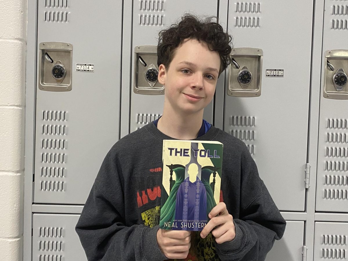 Freshman Liam Bell recently finished reading “The Toll” by Neal Shusterman. It is the third book in the dystopian trilogy, “Arc of a Scythe.” The novel follows the journeys of teenagers Citra and Rowan as they both live as scythes, people chosen to kill those for population control.