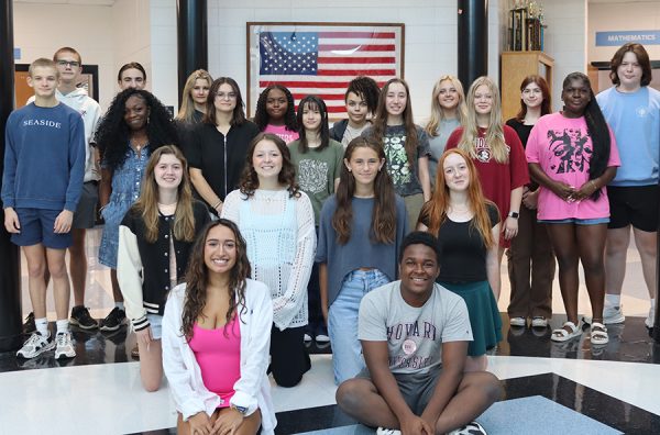 The 24-25 Prowler staff poses for a photo in the rotunda. The Prowler provides an experience that few classes do, true creative freedom.