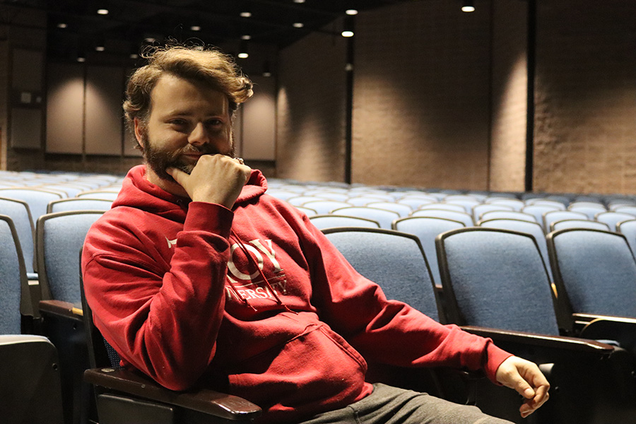 Cody Ward, the new drama teacher at Starr’s Mill, sits in the Willie Duke Auditorium. He was hired in late December to take on the position as director of the Starr’s Mill Thespians.