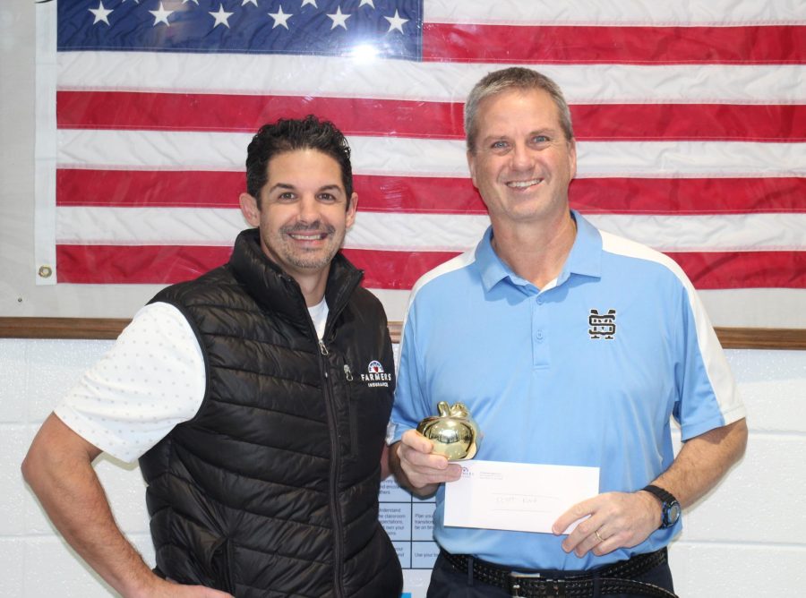 Band director Scott King is the December recipient of the Golden Apple award. He was selected by November’s recipient, Spanish teacher Amber Boyd, for his dedication to the band program and the fine arts.