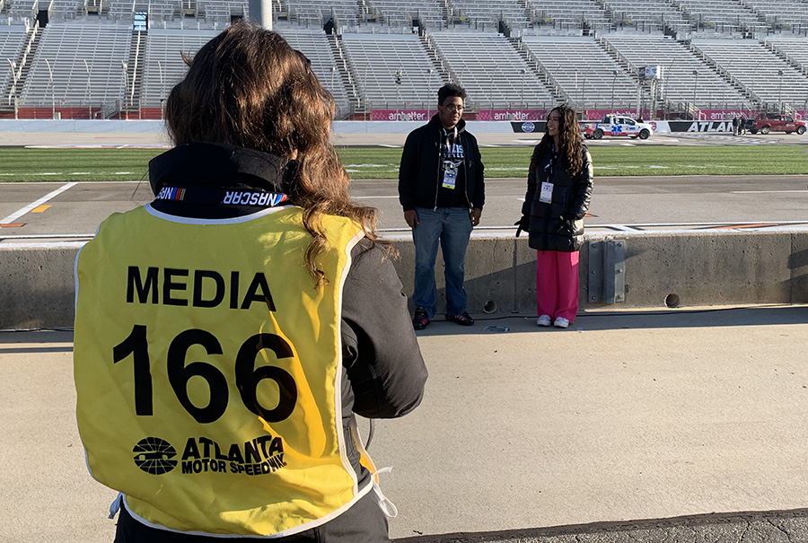 Here I am filming a promo video on pit road with Editors-in-Chief Micah Freeman and Crista Alracon. After working as a full-access photographer at Atlanta Motor Speedway this weekend, I understand the dedication of being a media journalist and photographer. Media plays an influential role in everyday life and people need to show more appreciation and support.