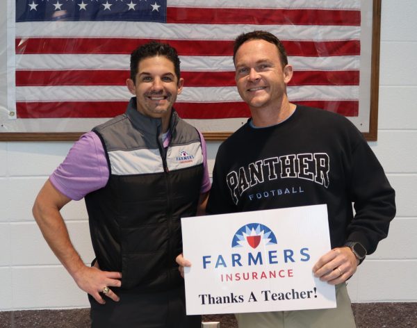 Football head coach David Cooper is February's recipient of the Golden Apple award. He was selected by December's recipient, band director Scott King, for his dedication to build up the football team and his players.