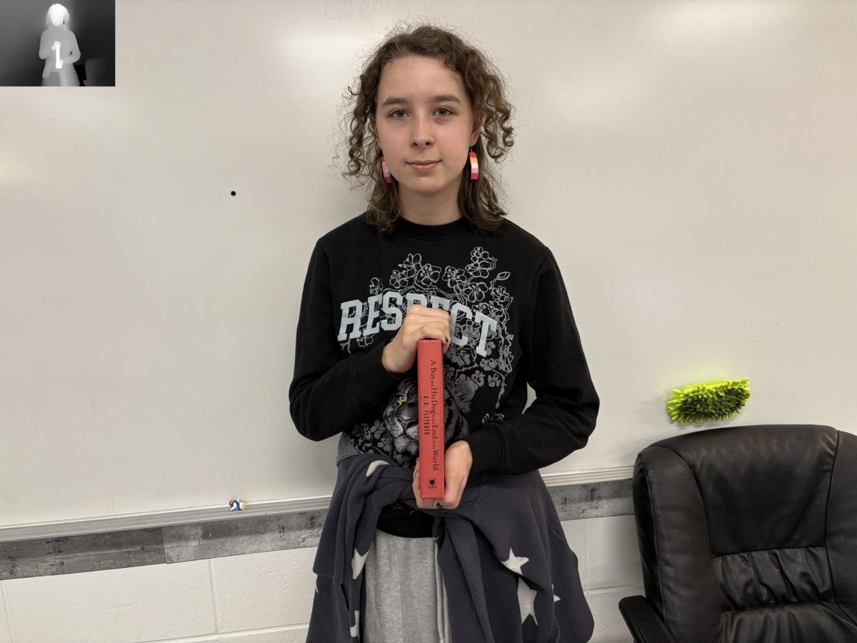 Senior Evie Rubenstein recently read “A Boy and His Dog at the End of the World” by Charlie Fletcher. The book follows a young boy who leaves a dystopian island to find his lost dog, finding much more than just that.